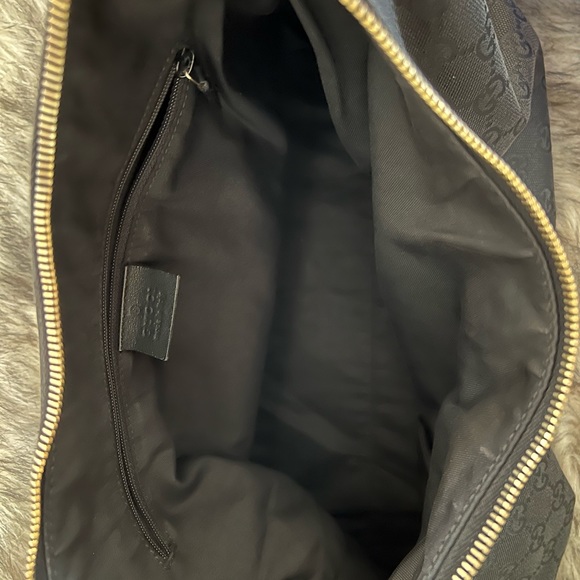 Gucci black canvas monogram hobo bag with gold buckle. Comes with a duster bag. - Picture 7 of 12